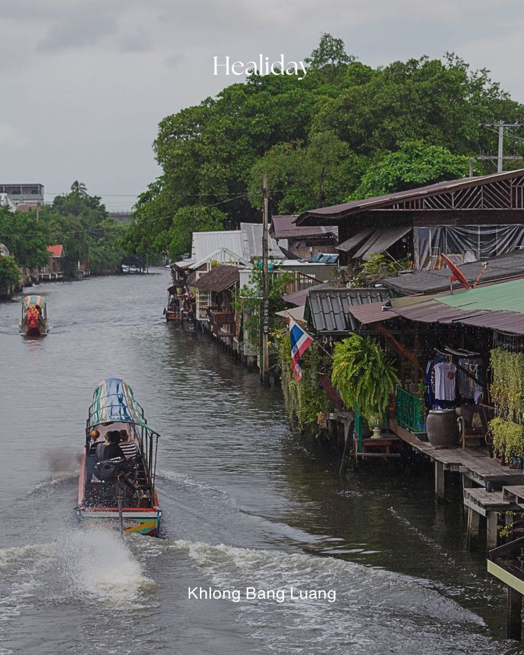 A longtail boat along the waterside community of Khlong Bang Luang, Bangkok