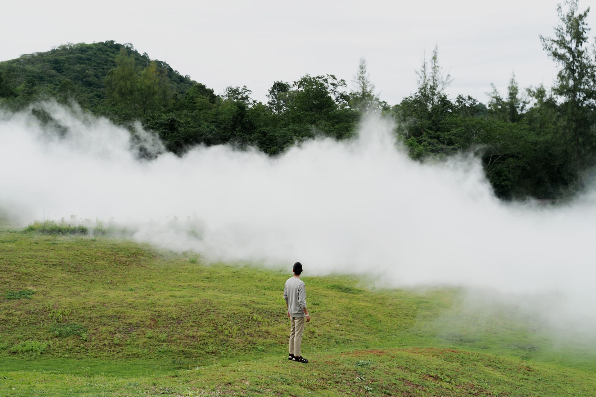 Mist drifting over the forests of Khao Yai during a Healiday corporate wellness retreat.