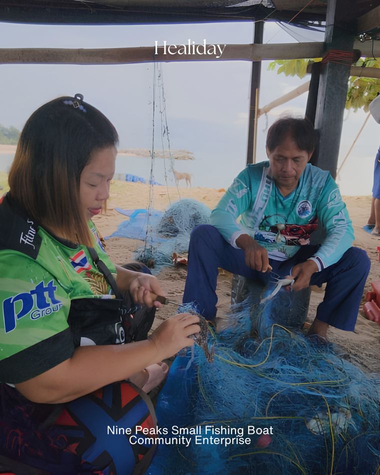 Local fishers mending nets at the Nine Peaks community enterprise, Rayong