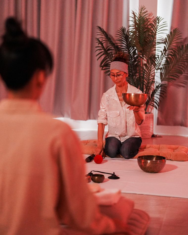 Sound healing with singing bowls.